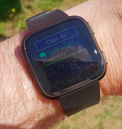 how to change brightness on fitbit versa